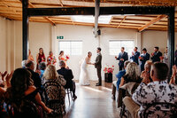 Bride and Groom during wedding ceremony at HQ thirtyfour in Fyshwick ACT