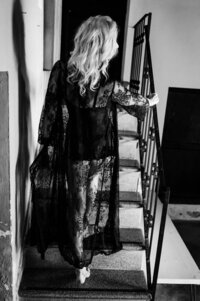 Boudoir experience studio on staircase walking