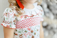 Close up photo of a christmas dresses details for Dondolo