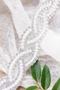 close up of bride dress belt