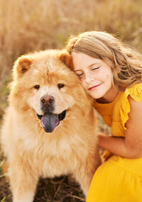 Child Cuddling with dog. McKinney, Texas family Photography