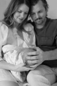 parents-smiling-newborn-black-white-in-home-lifestyle-boulder-colorado-48-B&W