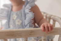 Photographer captures macro details of baby during her 1st birthday photoshoot at Holy City Babies Portrait Studio in Charleston, SC.