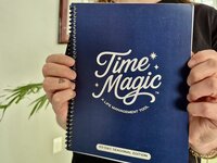 Close-up of the Time Magic Planner cover held in someone's hands.