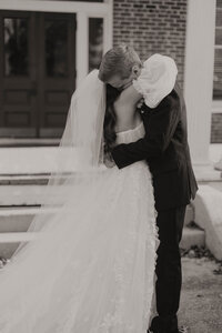 bride and groom embrace after first look