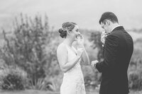 A Bride and Groom Laugh and Cry During Their Wedding Ceremony at the Garden of the Gods
