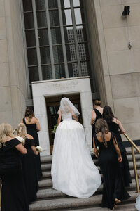 Fashion forward editorial wedding photography captures ceremony elegance at Old Post Office Chicago, showcasing Lauren Alatriste's sophisticated approach combining architectural beauty with magazine-worthy aesthetics and authentic wedding day emotion.