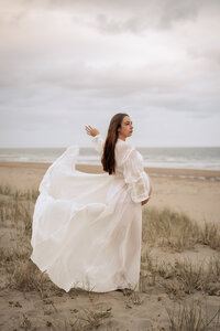 Hawkes Bay Maternity Photoshoot Ocean Beach Lightkeeper Photography with beautiful white robe