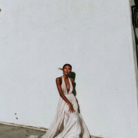 superherodesignco_34572_Vast_white_stucco_wall_with_one_bride_cac54dfa-14a6-4a67-8eef-05e2e00d6a25_2