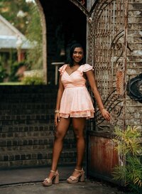 Senior portrait at Bella Sera Gardens in Loxley, Alabama — posing.