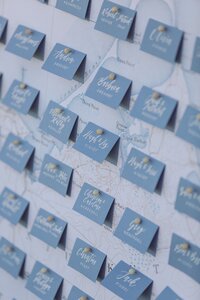 Baby blue place cards over map of Nantucket.