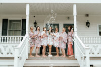 Bride and wedding party getting ready in guest rooms at Crossed Keys Inn