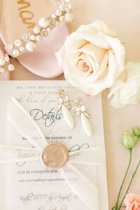 pink and white wedding invitations arrangement