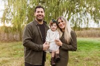 Family posing in Waterford Michigan Savvy Shoots Photography