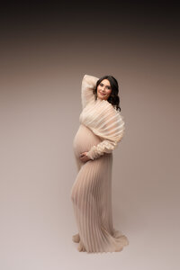 Charleston Maternity Photographer - Pregnant woman poses for Fine Art, Editorial Maternity Portraits at Holy City Babies Portrait Studio in Charleston, SC.