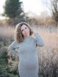 Magnuson Park winter maternity session in the grassy field