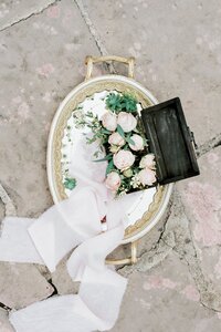 tray-with-roses-lies-tile-floor