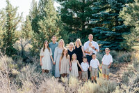 Lifestyle family photo captured in a grassy field in Bend, Oregon