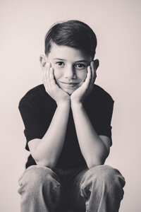Little boy poses for Personality Portraits at Holy City Babies Portrait Studio in Charleston, South Carolina.