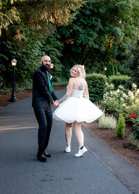 Bride and Groom having fun during their reception at the Abernethy Center in Oregon City.