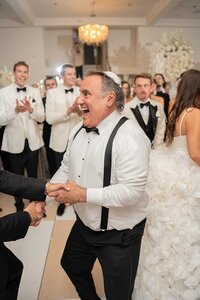 family dance at jewish wedding