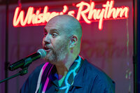 A person singing into a microphone