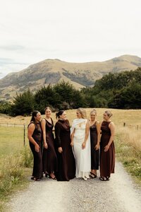Photography of a bridal party in the mountains during wedding photography in Christchurch