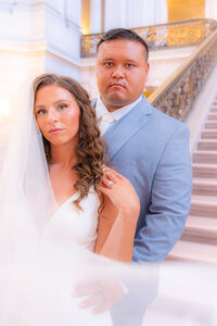 bride and groom veil stairs san francisco city hall wedding