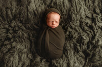 Newborn Photographer in Charleston - Newborn Baby sleeping during Newborn Portrait Session in Charleston, SC.