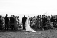 A bride walks down the aisle