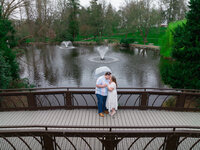 Aerial drone shot of an engaged couple during their engagement photo session, captured from above in a scenic outdoor location.