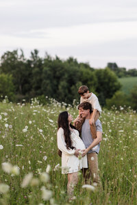 Maternity Photos in a flower field.CaitlynCloudPhotography214