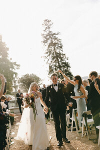 Wedding celebration at Keswick Vineyard. Florals by Flowergirl Cville and photography by Abby Hart.