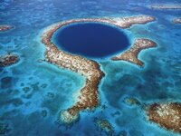 Aerial view of the Great Blue Hole in Belize, a mesmerizing natural wonder for divers and explorers.