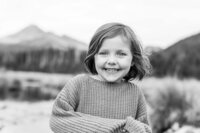 Kid looking at the camera during a candid outdoor session with Natalie Stephenson Photography