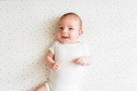 newborn-smiling-star-pattern-onesie