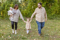 man, woman and two children walking for Shelby Township Family Photographer Savvy Shoots Photography
