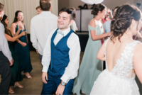 Groom dancing in middle of dance floor