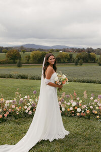 Bride at Renback Barn. Florals by Flowergirl Cville and photography by Brittany Stark Studios.