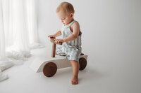 Baby celebrates his first birthday with Cake Smash Pictures at Holy City Babies Portrait Studio in Charleston, SC.