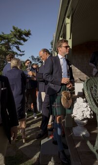 Wedding guest dressed in Scottish kilt.
