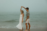 Couple dances on the beach in Wilmington