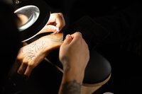 Close-up of hands preparing brow tools for beauty session. Photograph by Yucaipa branding photographer Kaitlyn Dawn Photography.