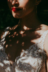bride standing in shadows