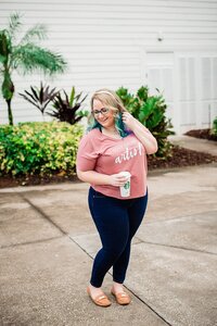 Mahlia wearing rose gold Love Story Artist shirt