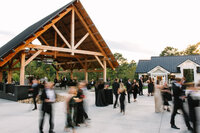 Smoky Mountain Wedding photographer captures cocktail hour during sunset