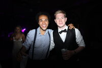 a photography of kevin de bruyne with tobiah tayo at his wedding