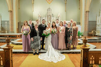 Family photo with the bride and groom in Los Angeles, captured in true to life color with clean natural light.