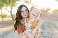 Mom embracing her child in a family session outdoor in Bend, oregon.