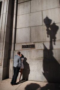 Couple embracing near Chicago City Hall after their elopement ceremony